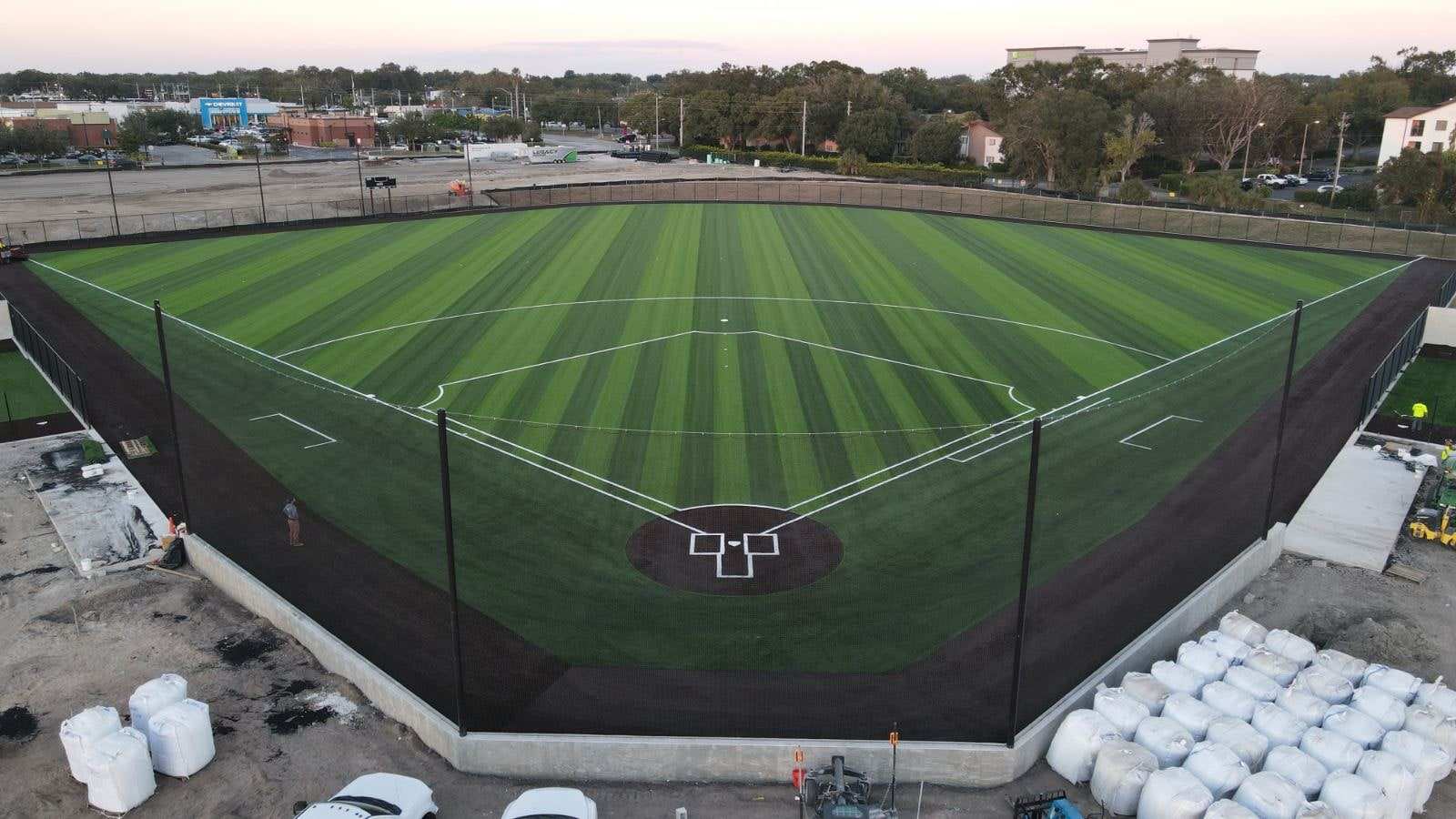Finished striped baseball field at dusk