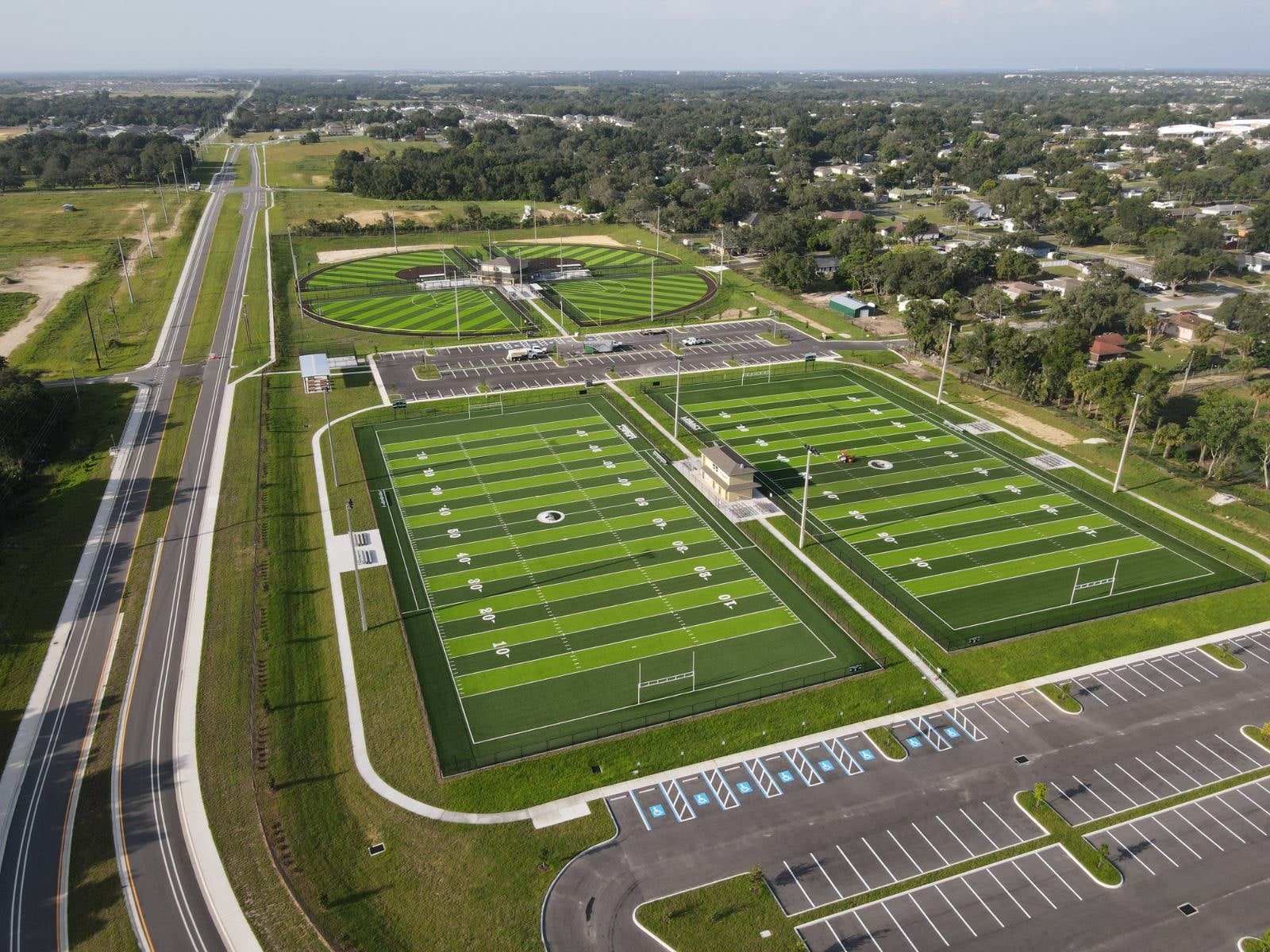 Two turf football fields at a parks complex