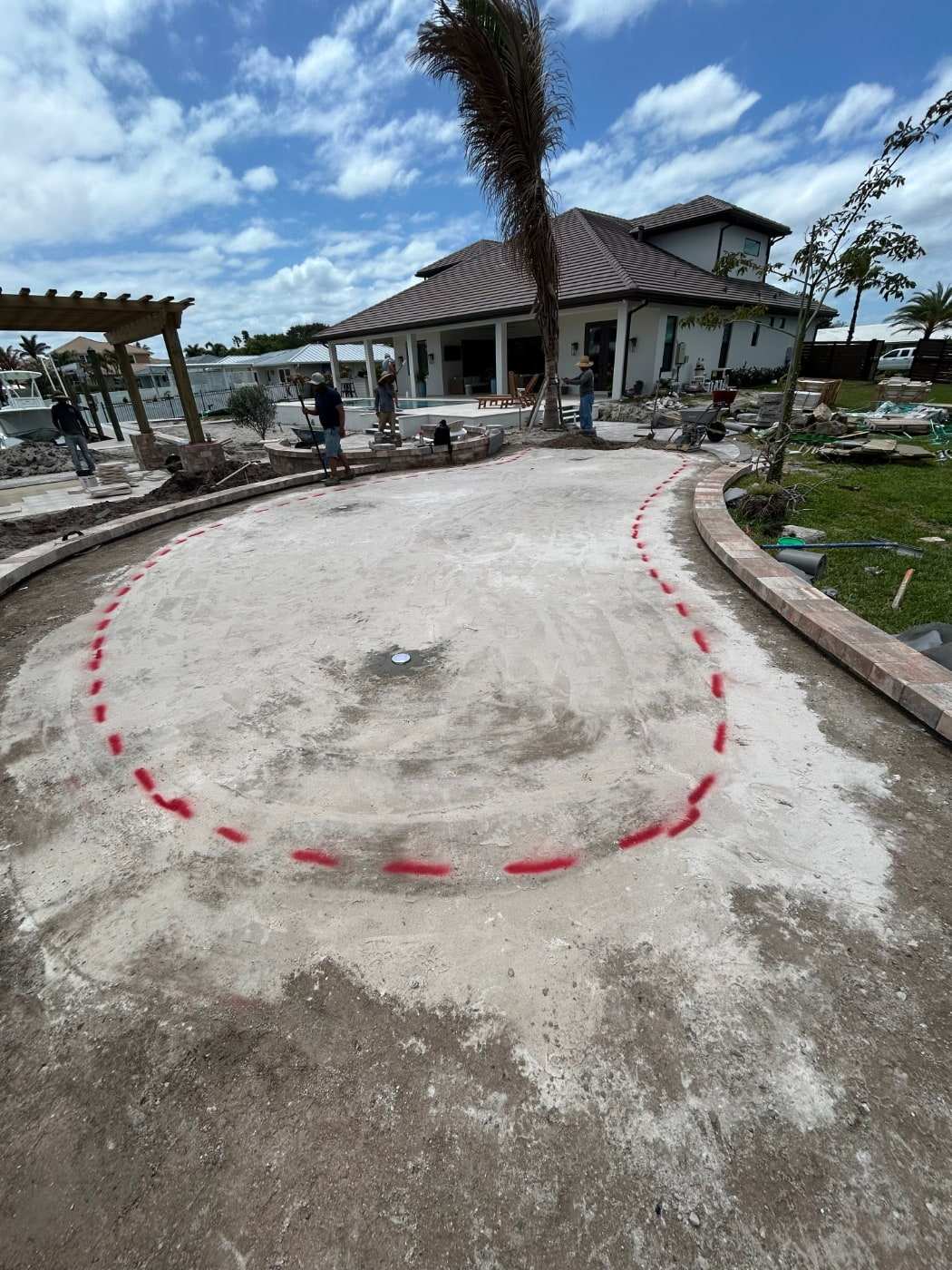Compacted base with the putting green outline marked in paint