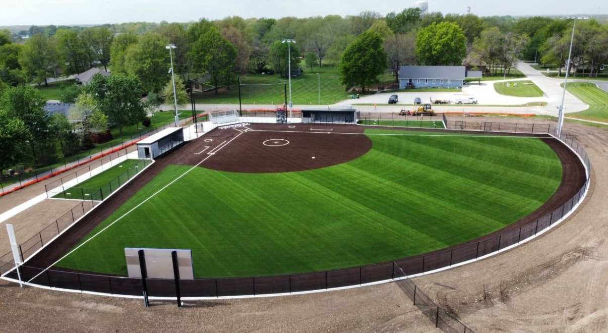 Aerial view of a softball field with a Speed Zone turf outfield